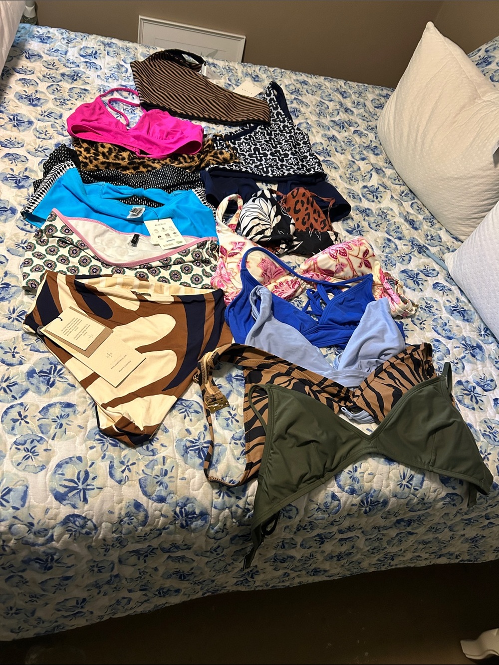 Lot of bikini tops and some bottoms; several brands .